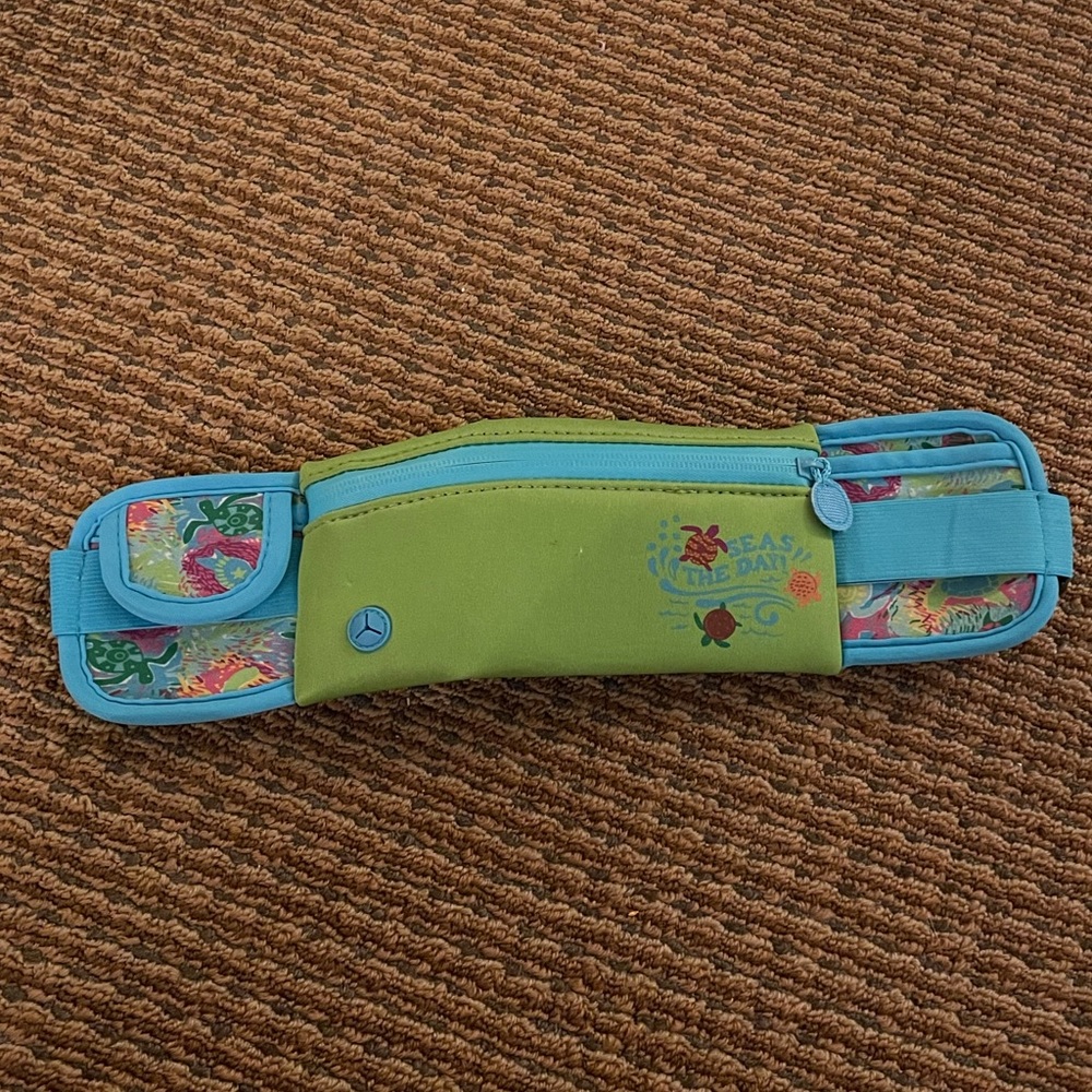 Floral fanny pack with blue and green turtles